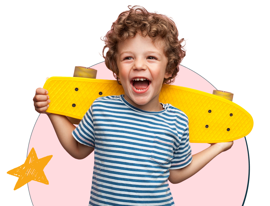 Primary age boy in striped shirt holding yellow skateboard, excited because of Robohouse's robotics for kids K-6 program.